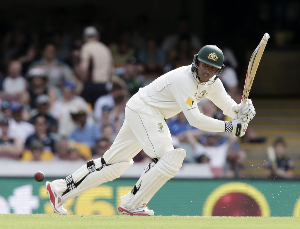 Australia's Usman Khawaja plays a shot during play on day one of the first cricket test between Australia and New Zealand in Brisbane. Photo: AP Photo/Tertius Pickard. Australia's Usman Khawaja plays a shot during play on day one of the first cricket test between Australia and New Zealand in Brisbane. Photo: AP Photo/Tertius Pickard.