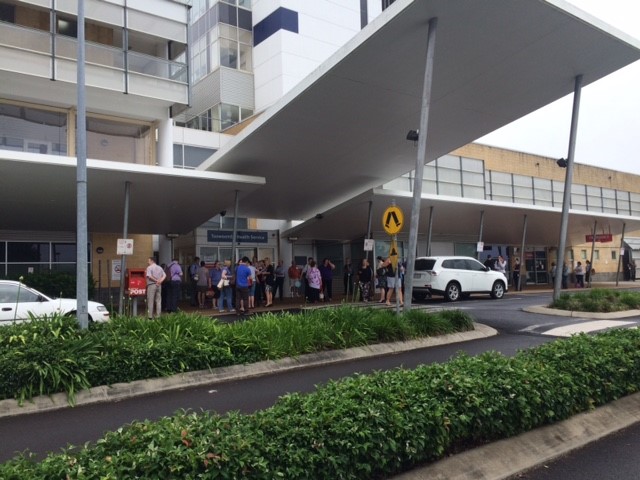 Staff gather outside the Toowoomba Hospital after a bomb threat was received this morning. Staff gather outside the Toowoomba Hospital after a bomb threat was received this morning.