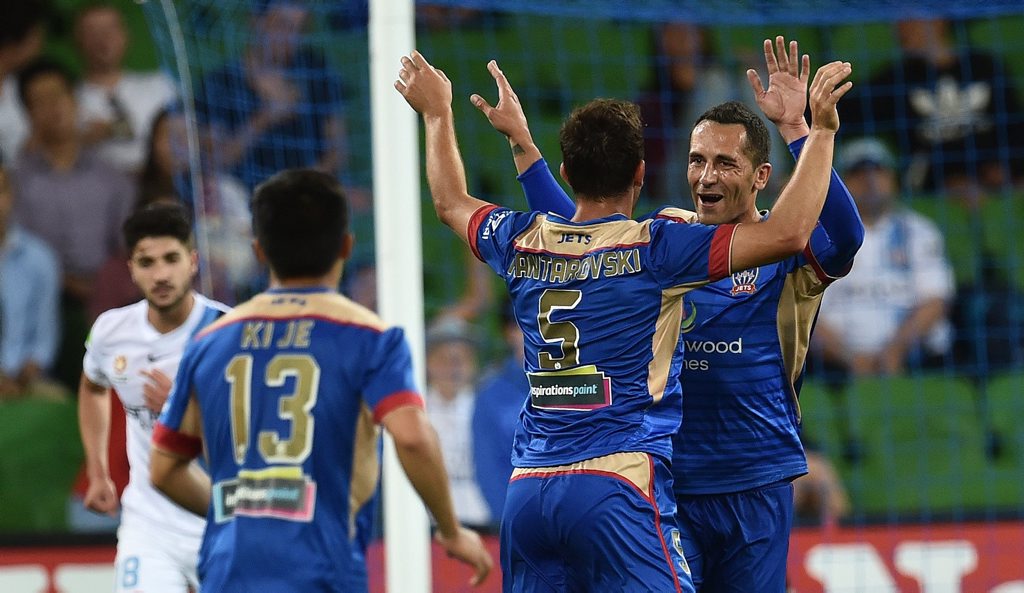 Milos Trifunovic celebrates a goal with Ben Kantarovski against Melbourne City at AAMI Stadium last Friday. Photo: AAP Image/Julian Smith. Milos Trifunovic celebrates a goal with Ben Kantarovski against Melbourne City at AAMI Stadium last Friday. Photo: AAP Image/Julian Smith.
