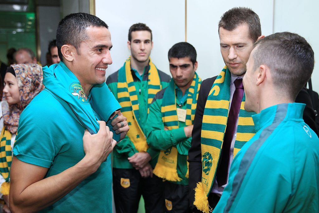 Tim Cahill and Matt McKay chat with former national teammate Brett Emerton during a Socceroos visit to Parliament House in Canberra on Monday. Photo: Stefan Postles/Getty Images. Tim Cahill and Matt McKay chat with former national teammate Brett Emerton during a Socceroos visit to Parliament House in Canberra on Monday. Photo: Stefan Postles/Getty Images.