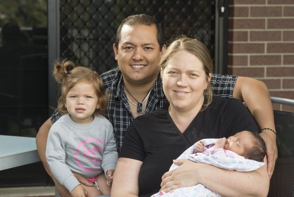Image for sale: Lennyn Alexis Tansacha just couldn’t wait to meet her parents. Rachael Matthews, and big sister Arianna Tansacha.