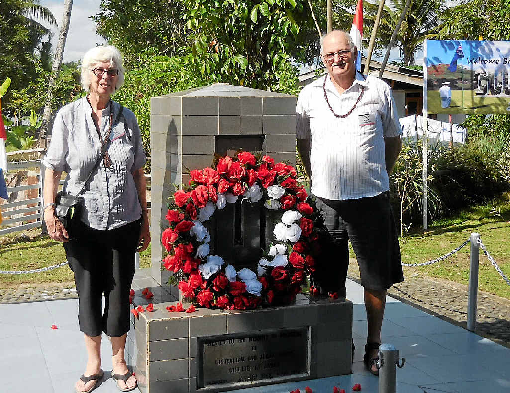FAMILY PRIDE: Gympie’s Alex Miles and his cousin Joan Tucker, of Glass House Mountains, at the Australian war memorial in Ambon. ABOVE RIGHT: Alex and Joan’s uncle Albert Miles who died in Ambon Island POW camp after more than three years a prisoner of the Japanese.