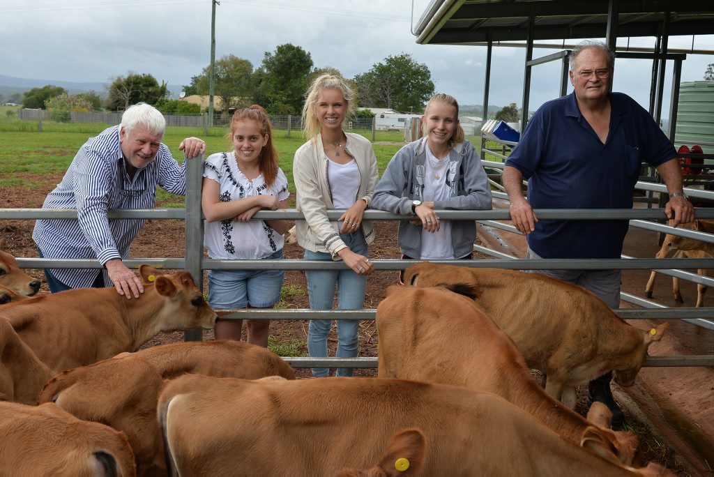 Professor of Sustainability at the University of the Sunshine Coast (left) Tor Hundlo and Cooloola Milk owner operator (right) Dick Schroeder with students from Bond University, Amy Quirk, Daisy Goodwin and Keeley Hartzer.Photo Patrick Woods / Gympie Times Professor of Sustainability at the University of the Sunshine Coast (left) Tor Hundlo and Cooloola Milk owner operator (right) Dick Schroeder with students from Bond University, Amy Quirk, Daisy Goodwin and Keeley Hartzer.Photo Patrick Woods / Gympie Times