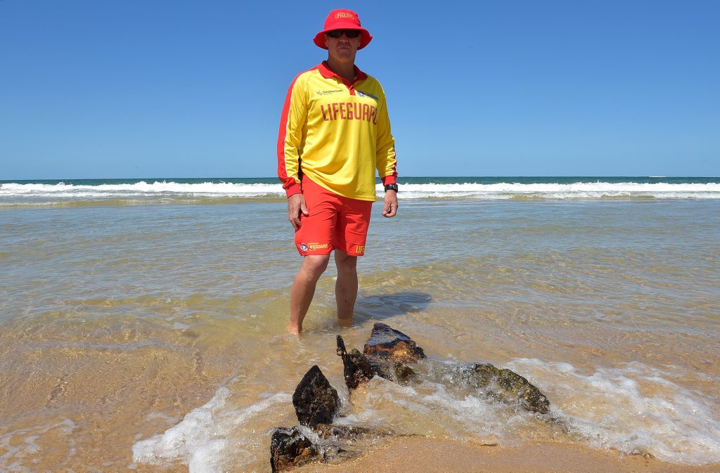 Reappearance of the Dicky shipwreck. It was firsty noticed on Saturday (07/11/15 )by beach goers Lifeguard Greg Steele looks at the wreck. Photo: Warren Lynam / Sunshine Coast Daily Reappearance of the Dicky shipwreck. It was firsty noticed on Saturday (07/11/15 )by beach goers Lifeguard Greg Steele looks at the wreck. Photo: Warren Lynam / Sunshine Coast Daily