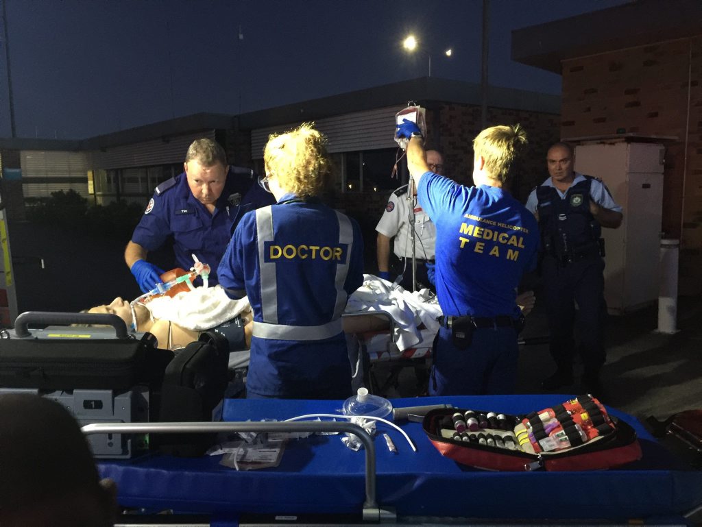 Doctors and paramedics at work on shark attack victim Sam Morgan at Ballina airport where they set up a resuscitation work platform and administered three units of blood. Doctors and paramedics at work on shark attack victim Sam Morgan at Ballina airport where they set up a resuscitation work platform and administered three units of blood.