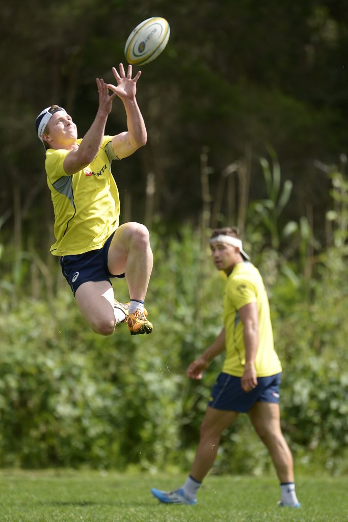 Henry Hutchison jumps for a high ball during an Australian men's rugby sevens training session at Sydney Academy of Sport this week. Photo: Brett Hemmings/Getty Images. Henry Hutchison jumps for a high ball during an Australian men's rugby sevens training session at Sydney Academy of Sport this week. Photo: Brett Hemmings/Getty Images.