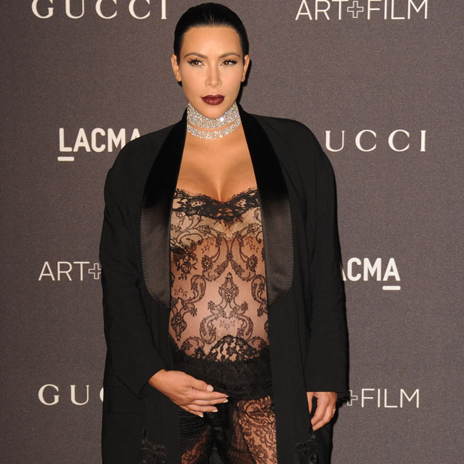 Kim Kardashian West claims her unborn son is the same weight as a Kim Kardashian West claims her unborn son is the same weight as a