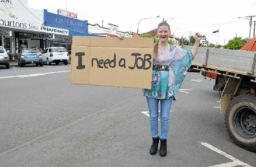 DESPERATE MEASURES: Shantelle Davis is hitting the streets with her placard to try and find a job. DESPERATE MEASURES: Shantelle Davis is hitting the streets with her placard to try and find a job.