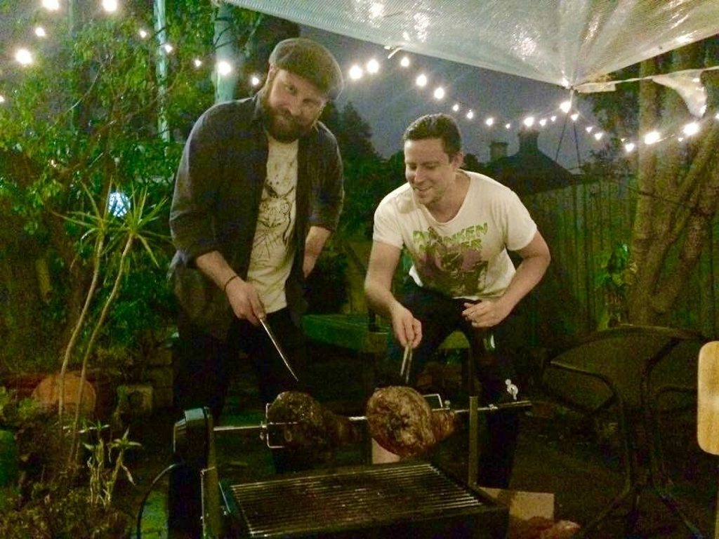 Spit roaster extraordinaire Michael Hanney (left) and Chris Calcino fly blind into the world of rotisserie cuisine. Photo Tez Iannelli Spit roaster extraordinaire Michael Hanney (left) and Chris Calcino fly blind into the world of rotisserie cuisine. Photo Tez Iannelli
