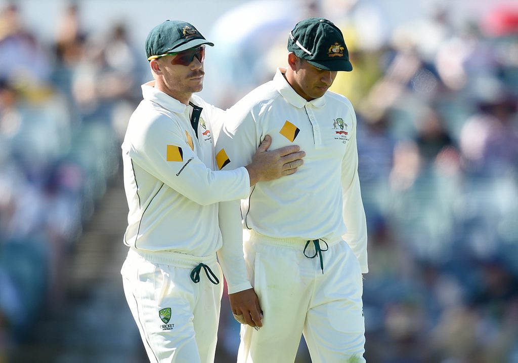 Australia's David Warner consoles Usman Khawaja as he leaves the field after sustaining an injury in the field. Photo: AAP Image/Dave Hunt. Australia's David Warner consoles Usman Khawaja as he leaves the field after sustaining an injury in the field. Photo: AAP Image/Dave Hunt.