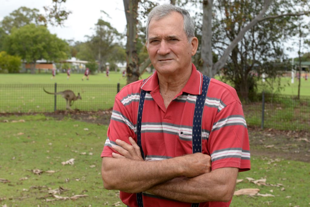 WAITING FOR RESULTS: Joe Ellul is concerned about the welfare of a female Eastern Grey kangaroo trapped in a paddock behind the Church of Christ in Sims Road. Photo: Mike Knott / NewsMail WAITING FOR RESULTS: Joe Ellul is concerned about the welfare of a female Eastern Grey kangaroo trapped in a paddock behind the Church of Christ in Sims Road. Photo: Mike Knott / NewsMail