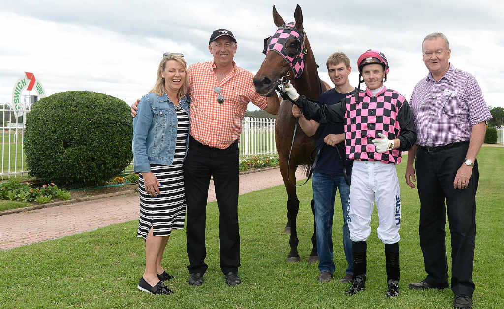POPULAR WINNER: Ipswich Turf Club deputy chairman Brian North (right) shares the victory of Classic Star with trainer Robert Heathcote, his delighted wife Vicki, jockey Ryan Wiggins and the horse’s strapper. POPULAR WINNER: Ipswich Turf Club deputy chairman Brian North (right) shares the victory of Classic Star with trainer Robert Heathcote, his delighted wife Vicki, jockey Ryan Wiggins and the horse’s strapper.