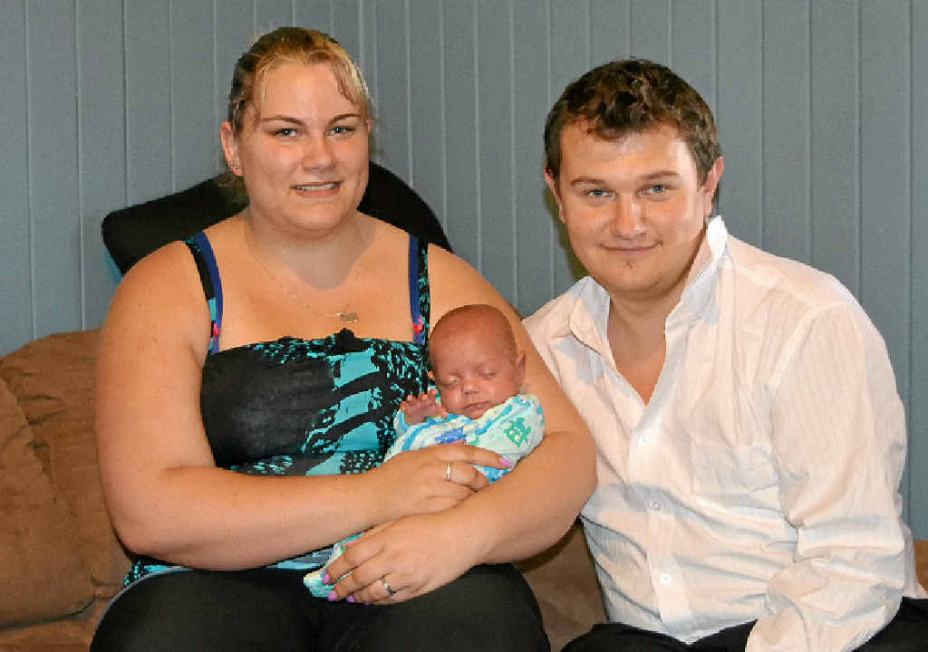 EARLY ARRIVAL: Stephanie Gribble holds baby Jake Gribble with proud dad Alex Pickles. EARLY ARRIVAL: Stephanie Gribble holds baby Jake Gribble with proud dad Alex Pickles.