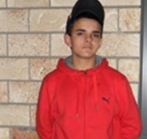 The 13-year-old boy (pictured) is described as of Aboriginal appearance with a slim build wearing a green collared t-shirt and black long pants. He was also wearing a red baseball cap and travelling on a white scooter. The 13-year-old boy (pictured) is described as of Aboriginal appearance with a slim build wearing a green collared t-shirt and black long pants. He was also wearing a red baseball cap and travelling on a white scooter.