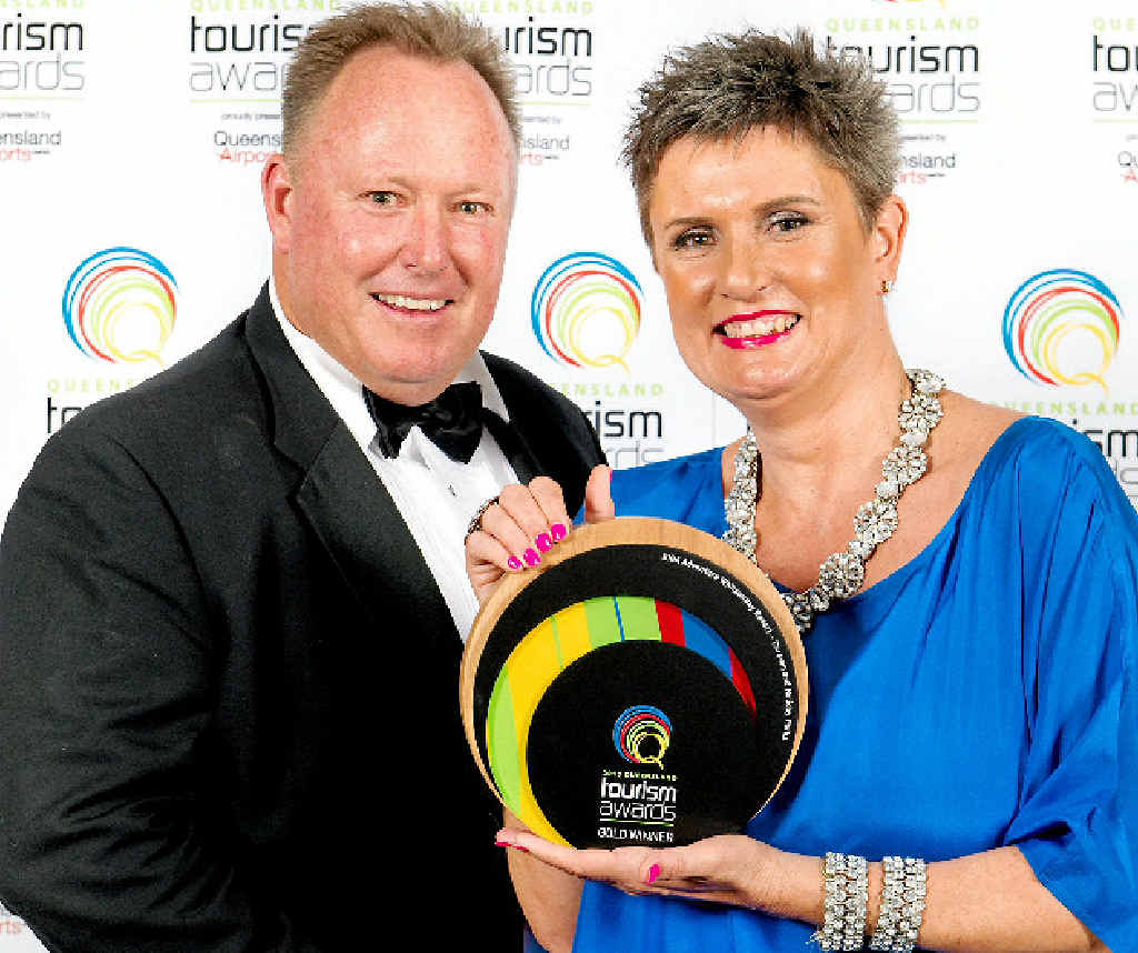 WINNERS ARE GRINNERS: BIG4 Adventure Whitsunday Resort owners enjoy their award. WINNERS ARE GRINNERS: BIG4 Adventure Whitsunday Resort owners enjoy their award.