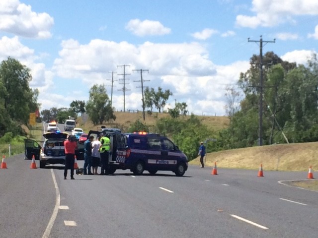 Paramedics treat a man who was tasered by police at the scene of a fatal traffic crash. Paramedics treat a man who was tasered by police at the scene of a fatal traffic crash.