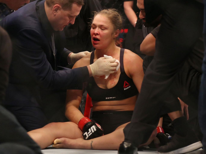 Ronda Rousey is treated after being defeated by Holly Holm Ronda Rousey is treated after being defeated by Holly Holm
