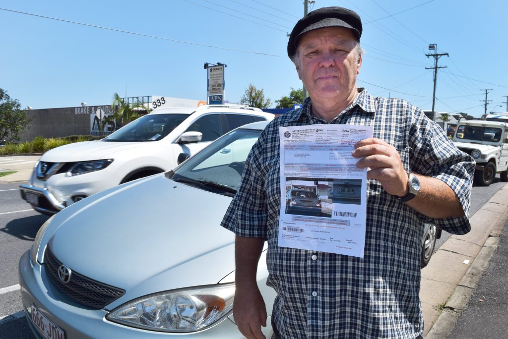 NOT FINE: Ray Brown is fighting a speeding fine because he believes the photo of him allegedly travelling at 49km/h was taken while he was parked at a traffic light. NOT FINE: Ray Brown is fighting a speeding fine because he believes the photo of him allegedly travelling at 49km/h was taken while he was parked at a traffic light.