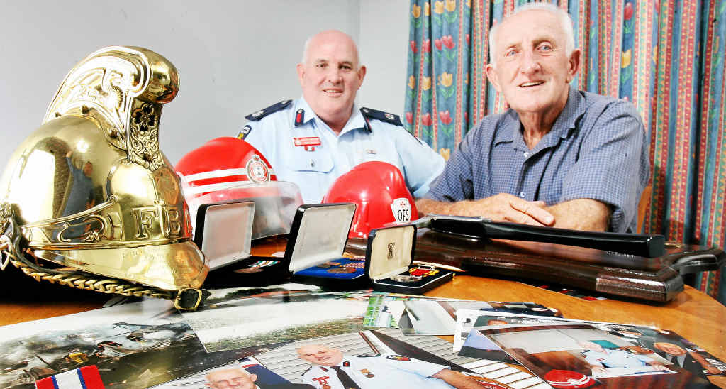 EXPERIENCE: QFRS Assistant Commissioner Mark Roche (left) followed in the footsteps of father Peter (right), to become a firefighter in Ipswich. EXPERIENCE: QFRS Assistant Commissioner Mark Roche (left) followed in the footsteps of father Peter (right), to become a firefighter in Ipswich.