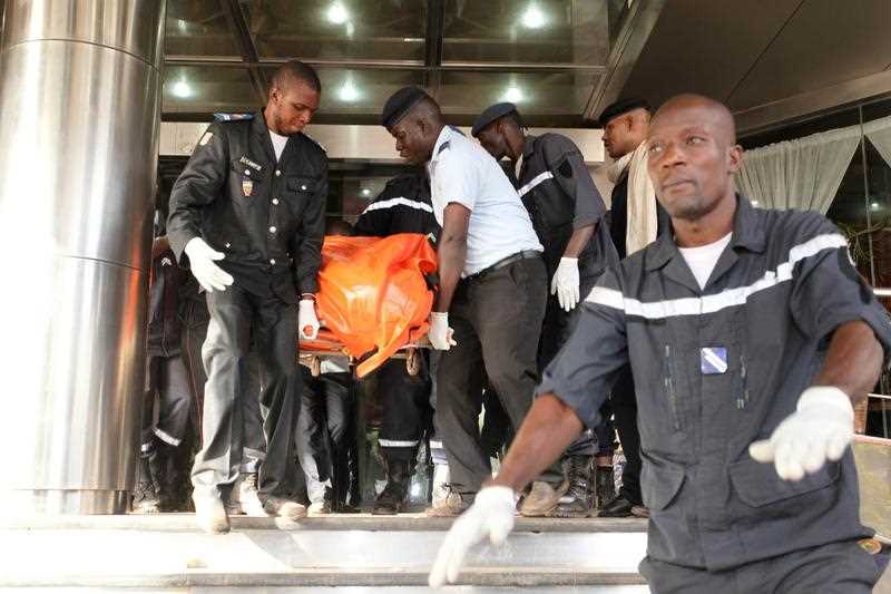 A body is removed from the Radisson Blu hotel, after it was stormed by gunmen during a attack on the hotel in Bamako, Mali, A body is removed from the Radisson Blu hotel, after it was stormed by gunmen during a attack on the hotel in Bamako, Mali,