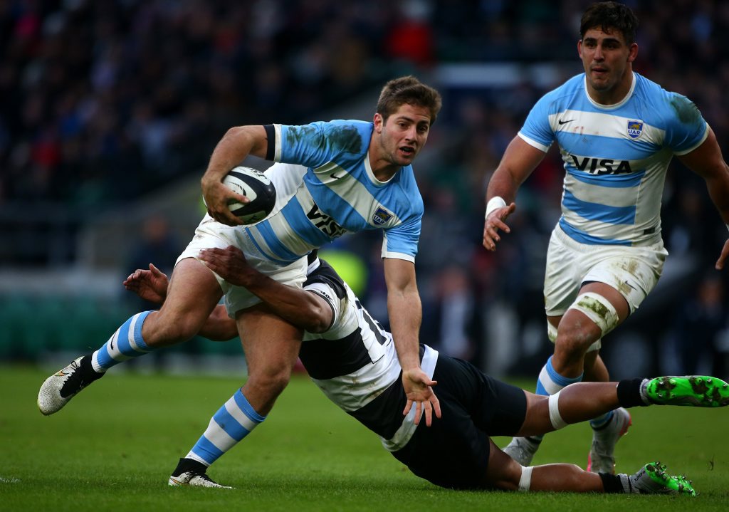 Santiago Cordero of Argentina slips the tackle from Stephen Moore of the Barbarians during the Killik Cup match at Twickenham Stadium. Photo: Charlie Crowhurst/Getty Images. Santiago Cordero of Argentina slips the tackle from Stephen Moore of the Barbarians during the Killik Cup match at Twickenham Stadium. Photo: Charlie Crowhurst/Getty Images.