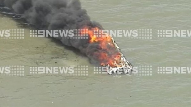 Flames tear through a boat in the southern Moreton Bay. Photo: Nine News Brisbane
Flames tear through a boat in the southern Moreton Bay. Photo: Nine News Brisbane