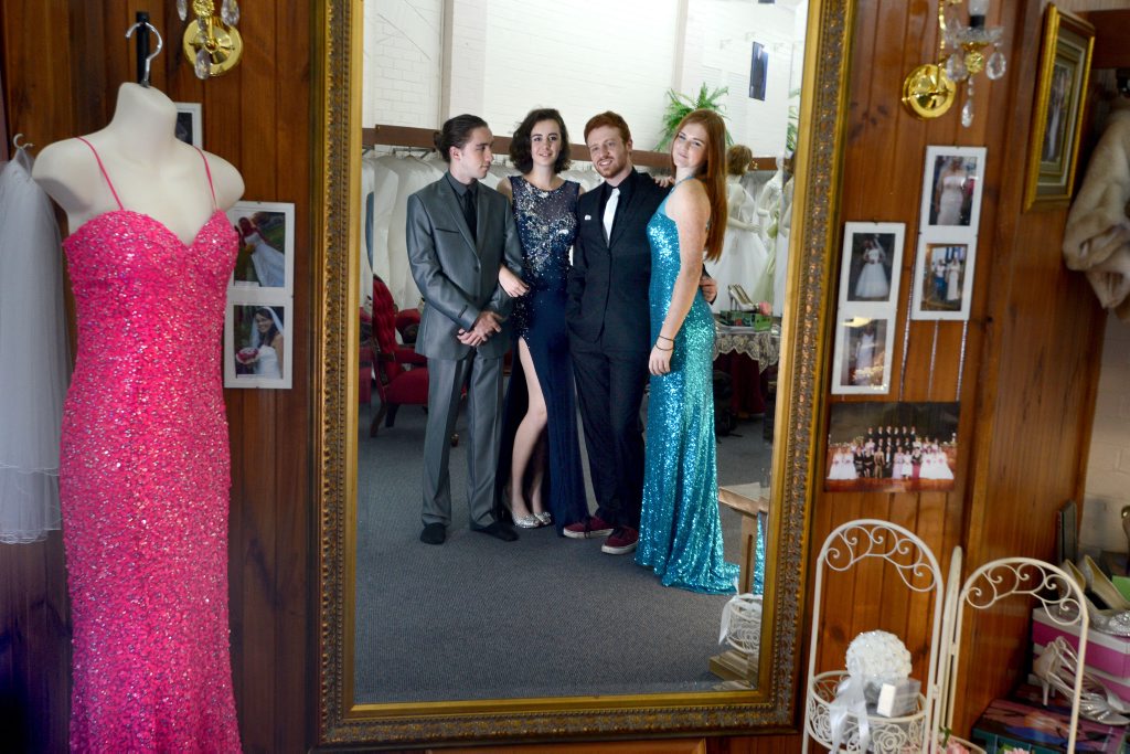 Richmond River High School students, from left Bodhi Towers, Teshan Joy, Ryley Adams, and Shannon Richardson, trying on outfits at Mary Vidler Bridal in Lismore for their formal. Photo Cathy Adams / The Northern Star Richmond River High School students, from left Bodhi Towers, Teshan Joy, Ryley Adams, and Shannon Richardson, trying on outfits at Mary Vidler Bridal in Lismore for their formal. Photo Cathy Adams / The Northern Star