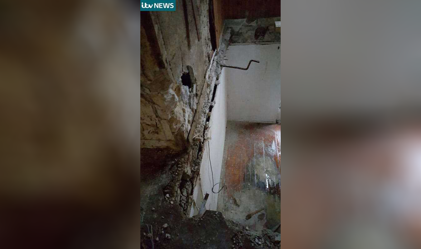 This is an undated handout photo issued by ITV News, showing a damaged wall inside the flat in Saint Denis, raided by police following the attacks in Paris. The hunt for the mastermind of last week's attacks took a bloody turn Wednesday, Nov. 18, 2015 to a Paris suburb where a fierce gunbattle with police left at least two people dead and eight arrested. This is an undated handout photo issued by ITV News, showing a damaged wall inside the flat in Saint Denis, raided by police following the attacks in Paris. The hunt for the mastermind of last week's attacks took a bloody turn Wednesday, Nov. 18, 2015 to a Paris suburb where a fierce gunbattle with police left at least two people dead and eight arrested.