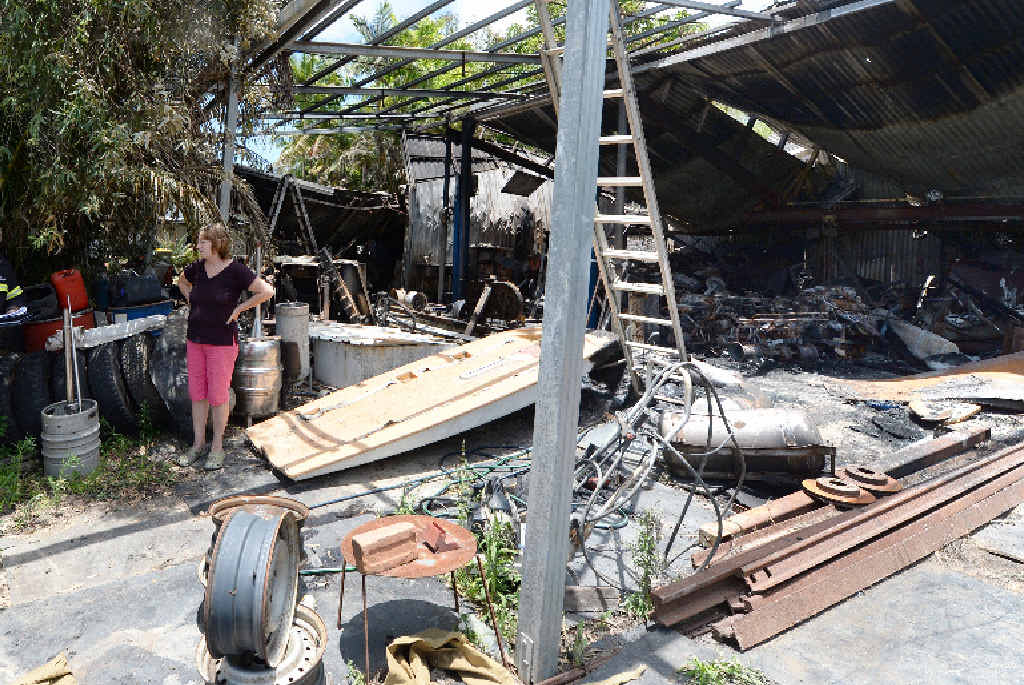 Brian Clacher and wife Rhonda Thompson, chat to Fire Inspector Geoff Townsley after their sheds were destroyed by fire. Brian Clacher and wife Rhonda Thompson, chat to Fire Inspector Geoff Townsley after their sheds were destroyed by fire.