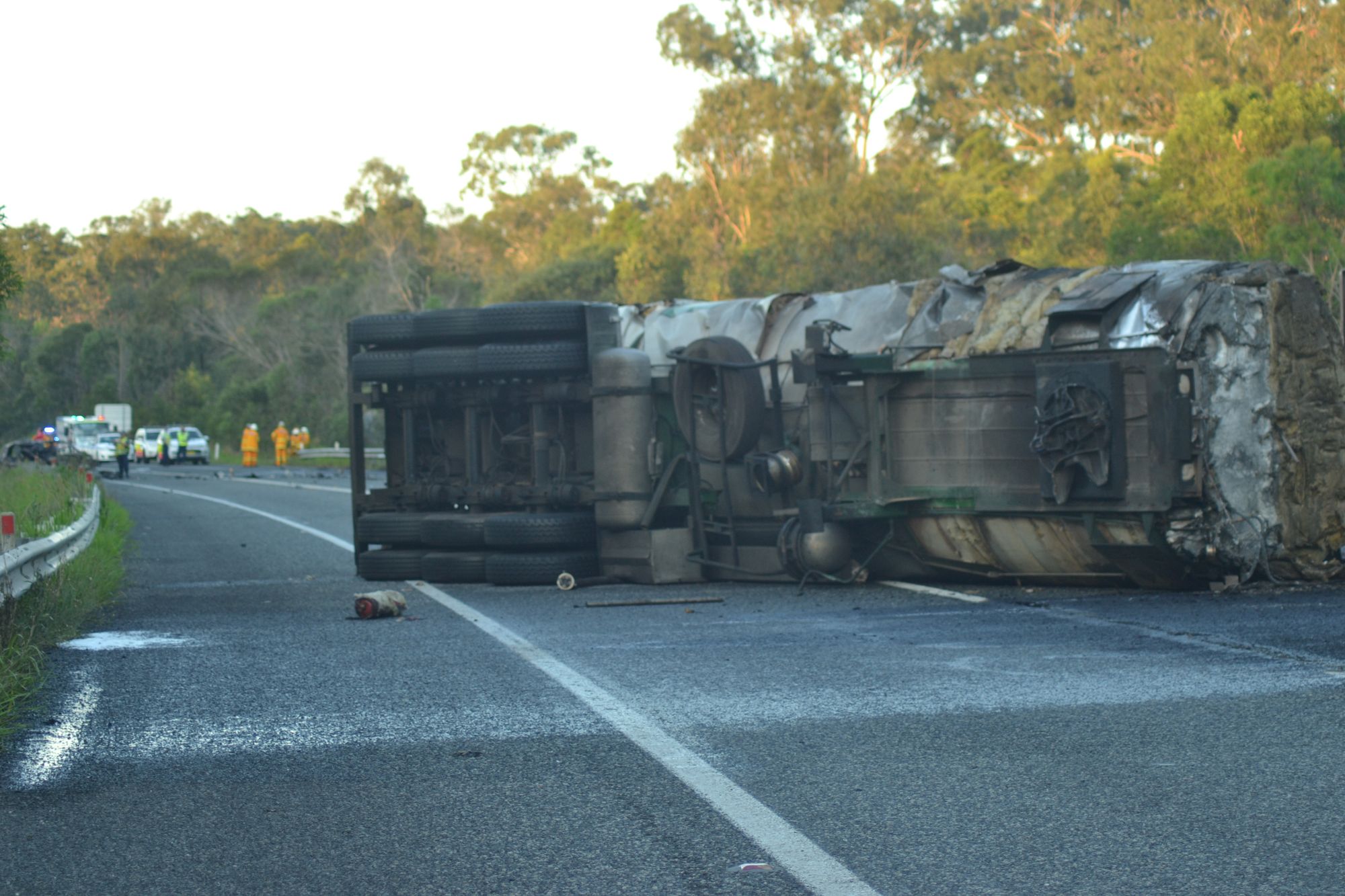 HEAD ON: A collision between a petrol tanker and sedan saw one person killed and the Pacific Highway, just south of Woodburn closed. HEAD ON: A collision between a petrol tanker and sedan saw one person killed and the Pacific Highway, just south of Woodburn closed.