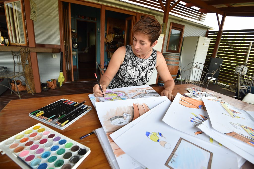 Amber Bates working on her drawings at home in Maryborough. Photo: Alistair Brightman / Fraser Coast Chronicle Amber Bates working on her drawings at home in Maryborough. Photo: Alistair Brightman / Fraser Coast Chronicle
