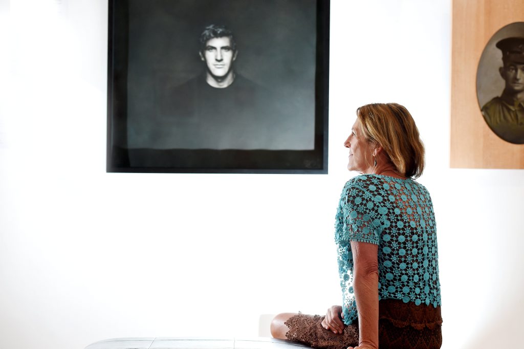 Jenny Gordon takes a moment to reflect on her daughter's artwork (Rosie Call) which won the People's Choice Award at the Regional Art Gallery. Photo Marc Stapelberg / The Northern Star Jenny Gordon takes a moment to reflect on her daughter's artwork (Rosie Call) which won the People's Choice Award at the Regional Art Gallery. Photo Marc Stapelberg / The Northern Star