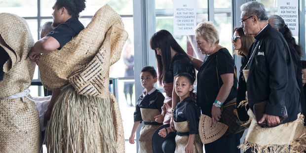 Nadene Lomu and her children Dhyreille and Brayley follow Jonah's casket into the service. Photo / Jason Oxenham Nadene Lomu and her children Dhyreille and Brayley follow Jonah's casket into the service. Photo / Jason Oxenham