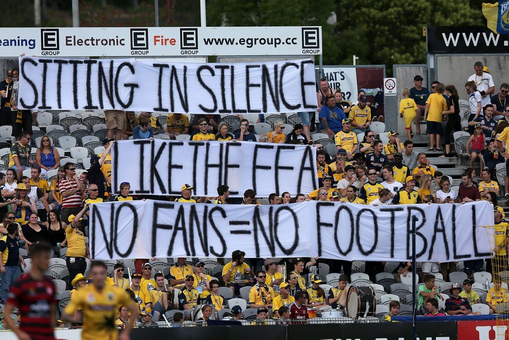 Mariners fans hold up a sign during the round eight A-League match between the Central Coast Mariners and the Western Sydney Wanderers at Central Coast Stadium in Gosford. Photo: Ashley Feder/Getty Images. Mariners fans hold up a sign during the round eight A-League match between the Central Coast Mariners and the Western Sydney Wanderers at Central Coast Stadium in Gosford. Photo: Ashley Feder/Getty Images.
