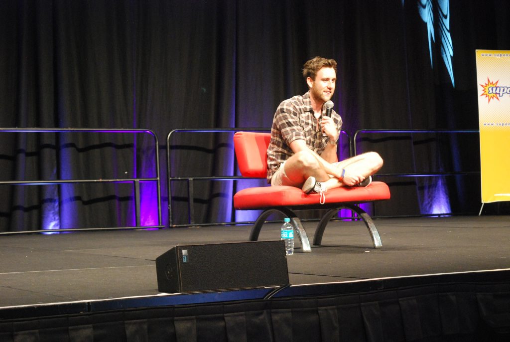 Matthew Lewis (Neville Longbottom from Harry Potter) speaks at a live panel for fans. Matthew Lewis (Neville Longbottom from Harry Potter) speaks at a live panel for fans.