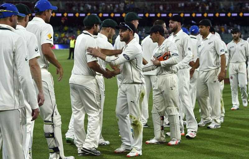 New Zealand's captain Brendon McCullum (C) shakes hands with Australian players at the end of the first day-night cricket Test match at the Adelaide Oval on November 29, 2015. New Zealand's captain Brendon McCullum (C) shakes hands with Australian players at the end of the first day-night cricket Test match at the Adelaide Oval on November 29, 2015.