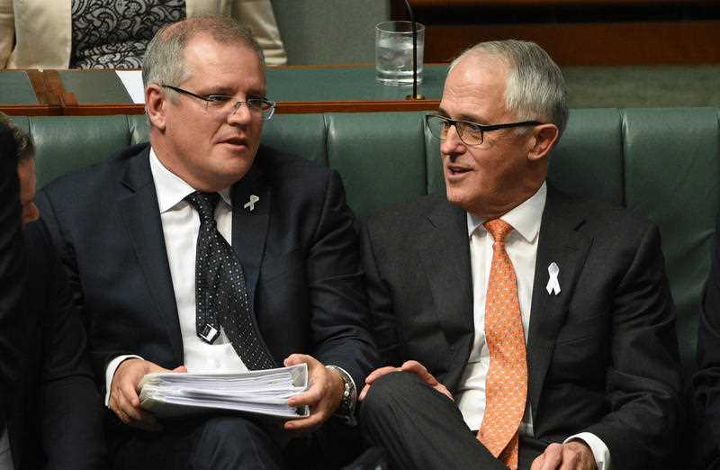 Treasurer Scott Morrison (L) and Prime Minister Malcolm Turnbull during Question Time at Parliament House in Canberra on Tuesday, Nov. 24, 2015. Treasurer Scott Morrison (L) and Prime Minister Malcolm Turnbull during Question Time at Parliament House in Canberra on Tuesday, Nov. 24, 2015.