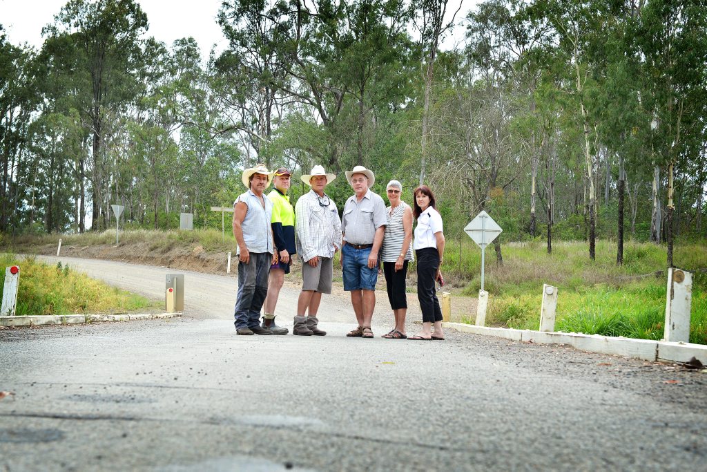 Woolooga residents standing on the Running Creek bridge wanting an upgrade are Phil Stanford, Steve Turner, Sean Barrett, Nevile and Joy Turner and Sharon Turner. Woolooga residents standing on the Running Creek bridge wanting an upgrade are Phil Stanford, Steve Turner, Sean Barrett, Nevile and Joy Turner and Sharon Turner.