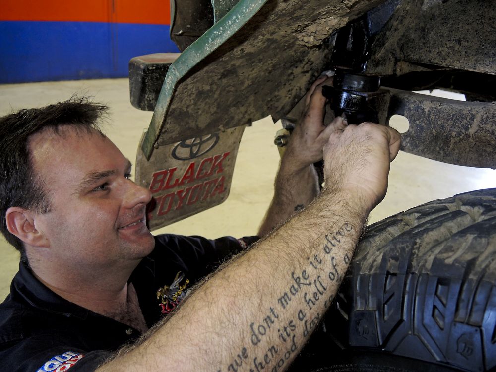 Milo's body mounts have been a problem for, oh, maybe the last fifteen years? Here Aaron's had to weld up another mount before fitting the new style bush. I've driven back from Tasmania with all the mounts broken and a big boat strap from chassis to roof rack without any worries though, mounts are kind of optional in an old Toyota... Milo's body mounts have been a problem for, oh, maybe the last fifteen years? Here Aaron's had to weld up another mount before fitting the new style bush. I've driven back from Tasmania with all the mounts broken and a big boat strap from chassis to roof rack without any worries though, mounts are kind of optional in an old Toyota...