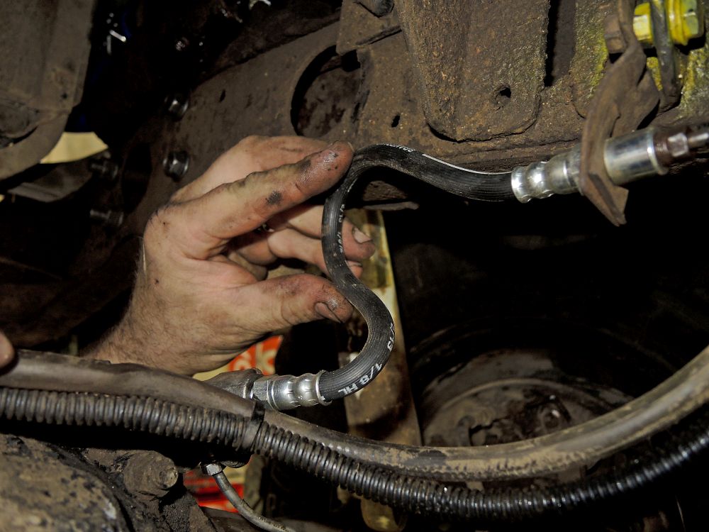 During the first full inspection a couple of the brake hoses were found to be a tad damaged from the constant flexing demanded by severe off-road work. Knowing the places Milo goes there's no way the team would let that pass so she copped some new ones both ends. With enough length to allow for the extra flex of course! During the first full inspection a couple of the brake hoses were found to be a tad damaged from the constant flexing demanded by severe off-road work. Knowing the places Milo goes there's no way the team would let that pass so she copped some new ones both ends. With enough length to allow for the extra flex of course!