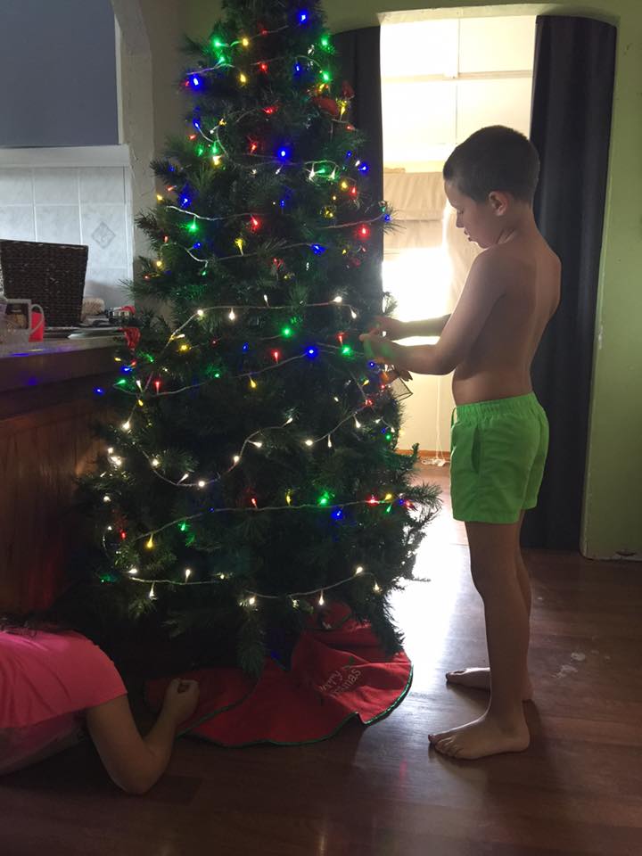 Narelle Smith- My daughter and son decorating and making sure even underneath is decorated Narelle Smith- My daughter and son decorating and making sure even underneath is decorated