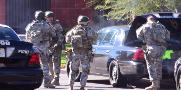 Police on the scene of the shooting in San Bernadino, California. Police on the scene of the shooting in San Bernadino, California.