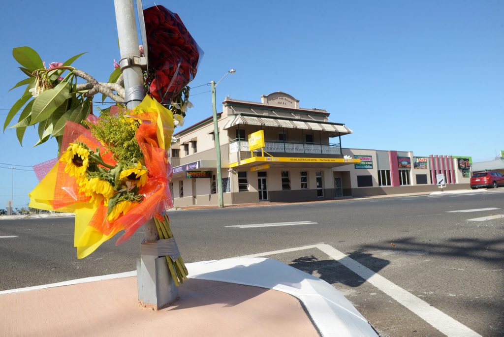ANOTHER FATALITY: Tributes mark the scene where a man lost his life on Friday afternoon after being run over in a hit and run incident outside Harry's Mowers in North Bundaberg. Photo: Max Fleet / NewsMail ANOTHER FATALITY: Tributes mark the scene where a man lost his life on Friday afternoon after being run over in a hit and run incident outside Harry's Mowers in North Bundaberg. Photo: Max Fleet / NewsMail