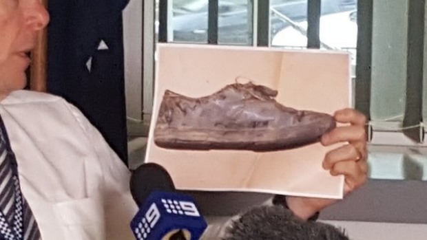 Superintendent Dave Hutchinson displays a picture of a shoe believed to have belonged to Tiahleigh Palmer, near where her body was found. Photo: Johanna Marie - Sky News
Superintendent Dave Hutchinson displays a picture of a shoe believed to have belonged to Tiahleigh Palmer, near where her body was found. Photo: Johanna Marie - Sky News
