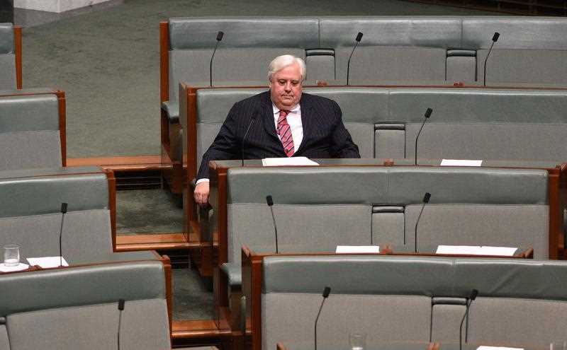 Palmer United Party leader Clive Palmer waits to speak on a matter of public importance at Parliament House in Canberra on Tuesday, Dec. 1, 2015. Palmer United Party leader Clive Palmer waits to speak on a matter of public importance at Parliament House in Canberra on Tuesday, Dec. 1, 2015.
