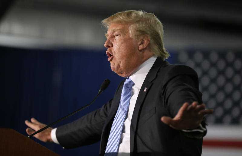 Republican presidential candidate Donald Trump speaks during a campaign rally, Saturday, Dec. 5, 2015, in Davenport, Iowa. Republican presidential candidate Donald Trump speaks during a campaign rally, Saturday, Dec. 5, 2015, in Davenport, Iowa.