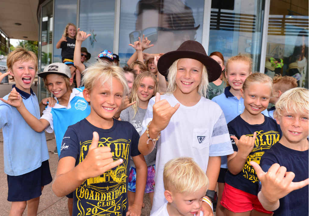Coolum groms, led by young surfers Ashton Pignat and Zane Assink, cheer on their home town hero Julian Wilson ahead of his vital world tour showdown in Hawaii today. Coolum groms, led by young surfers Ashton Pignat and Zane Assink, cheer on their home town hero Julian Wilson ahead of his vital world tour showdown in Hawaii today.