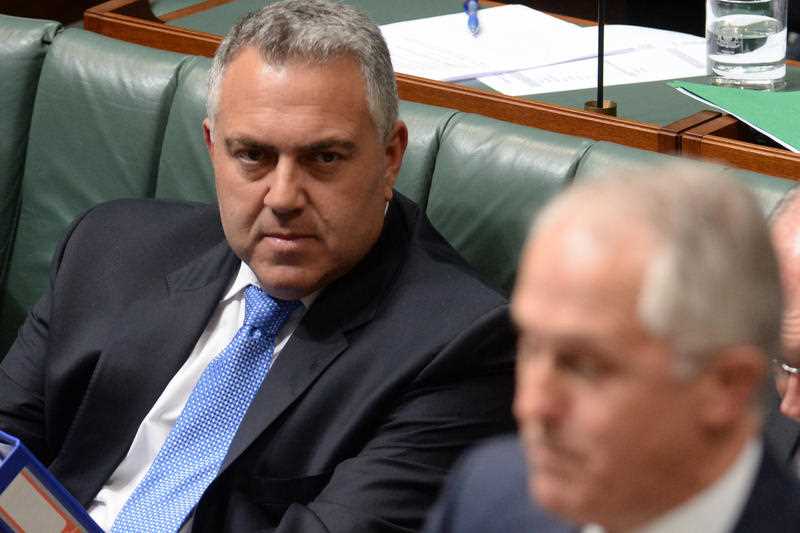 Wednesday, Sept. 16, 2015 file photo of Australian Federal Treasurer Joe Hockey and Australian Prime Minister Malcolm Turnbull during Question Time in the House of Representatives at Parliament House in Canberra. Former treasurer Hockey has been formally appointed Australia's next ambassador to the United States. Wednesday, Sept. 16, 2015 file photo of Australian Federal Treasurer Joe Hockey and Australian Prime Minister Malcolm Turnbull during Question Time in the House of Representatives at Parliament House in Canberra. Former treasurer Hockey has been formally appointed Australia's next ambassador to the United States.