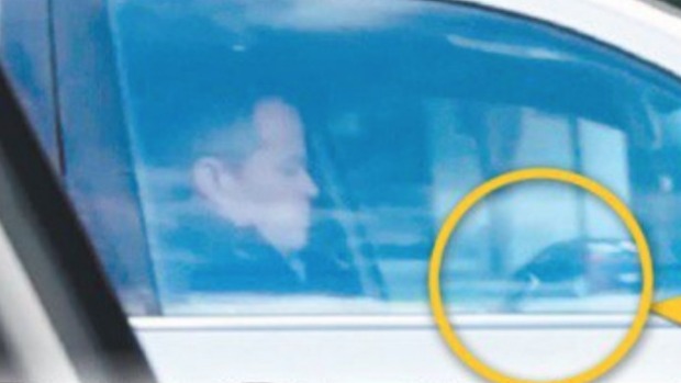 Opposition leader Bill Shorten caught on his phone while driving. Opposition leader Bill Shorten caught on his phone while driving.