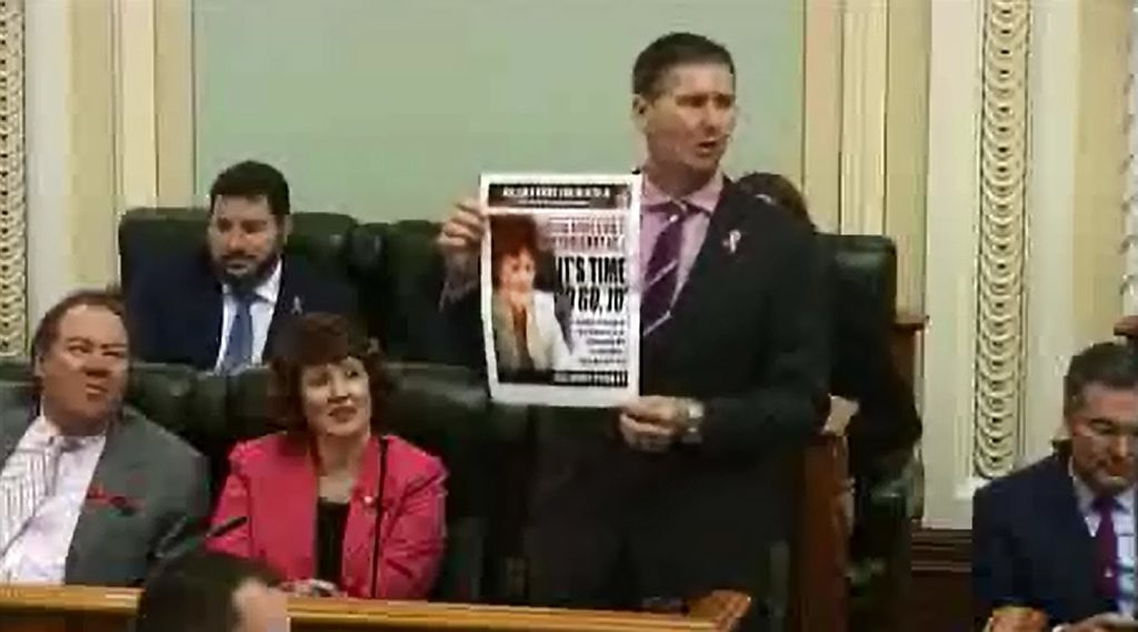 Oppostion leader Lawrence Springborg holds up a QT in parliament. Photo: Contributed Oppostion leader Lawrence Springborg holds up a QT in parliament. Photo: Contributed